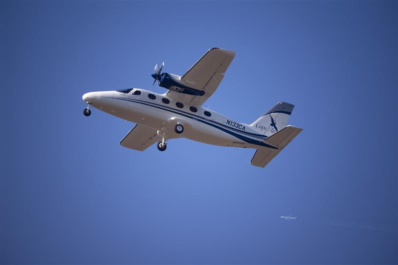 cape air plane flying blue sky